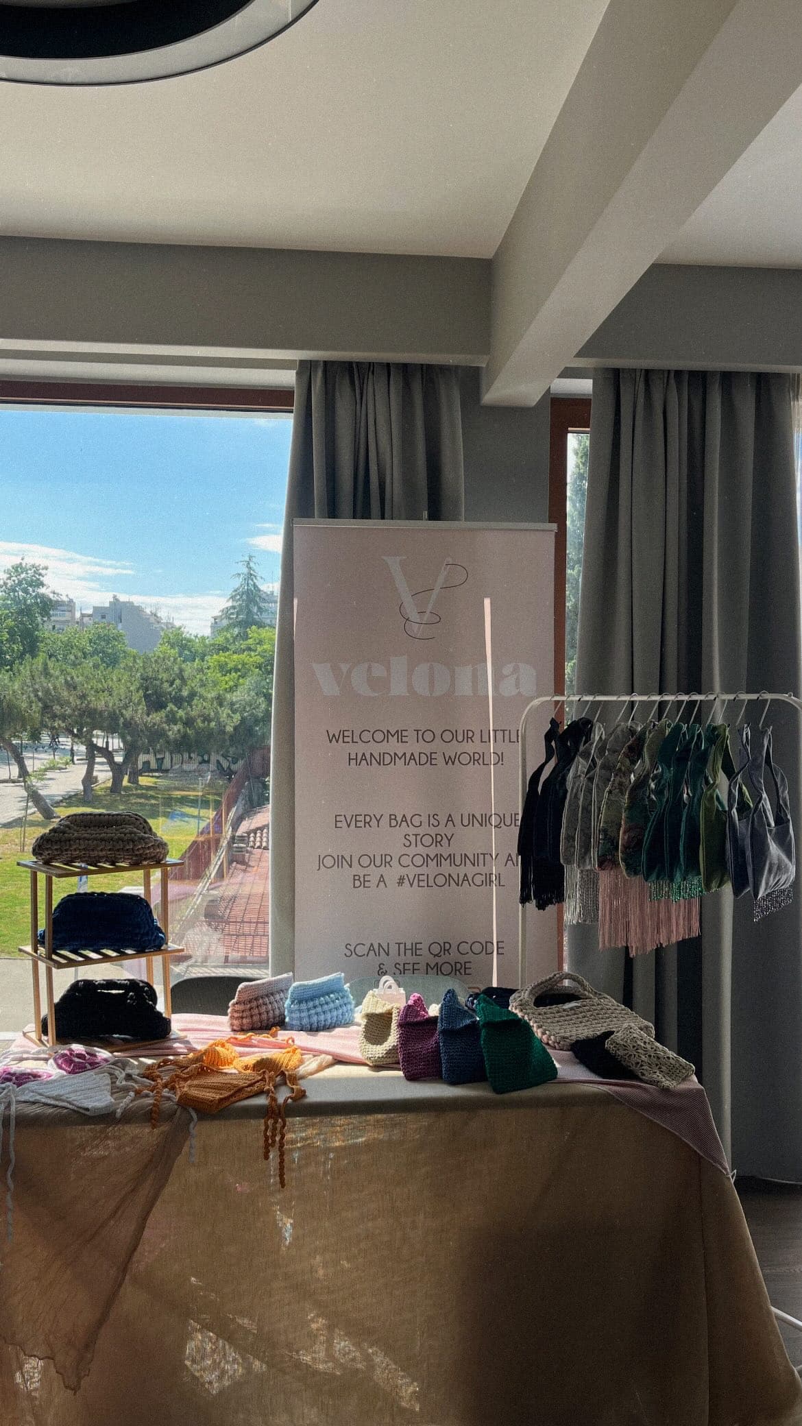 A selection of VELONA handmade bags displayed together